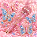 Blingy pink and blue rhinestone butterflies with a pink rhinestone microphone